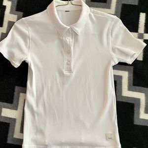 White fitted polo shirt by Vuori